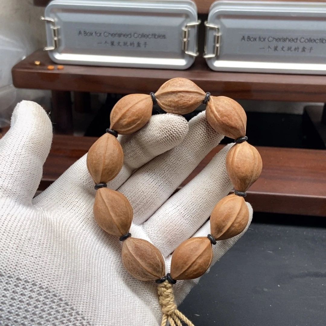 奈***の橄榄核手串1727三花