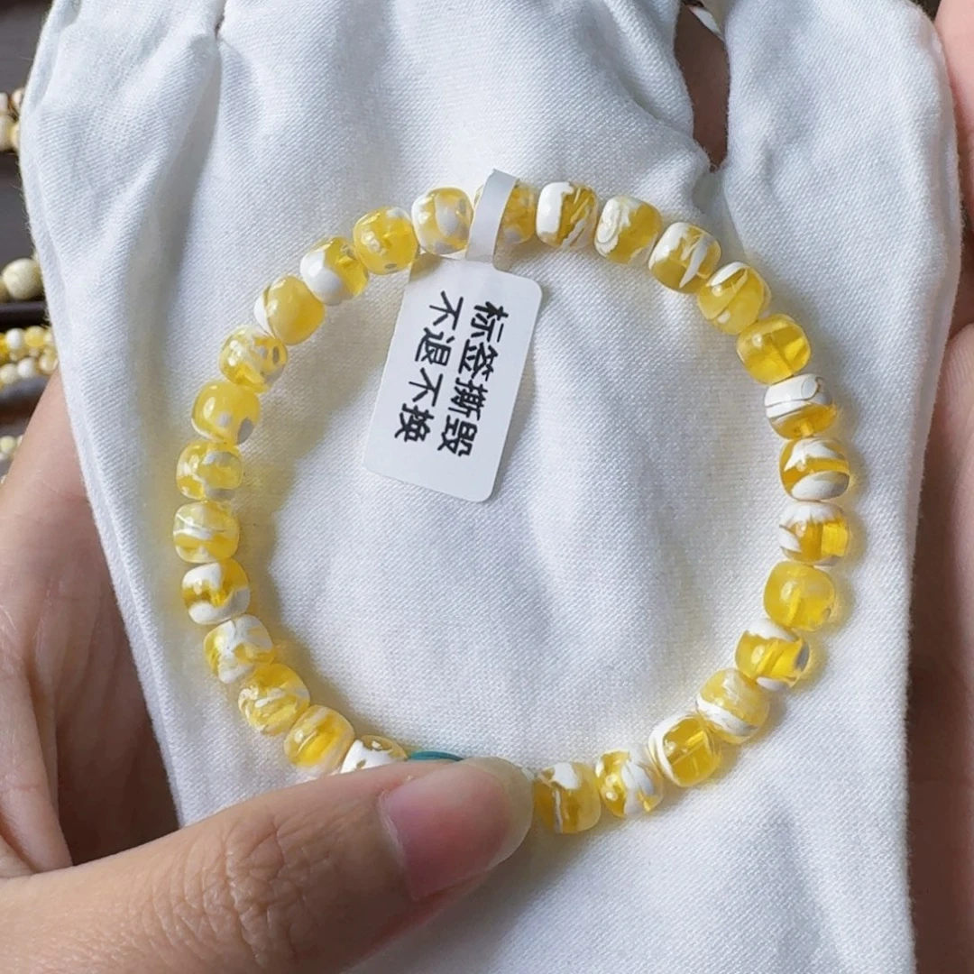 k***1裸石琥珀未镶嵌7mm漆白妖花