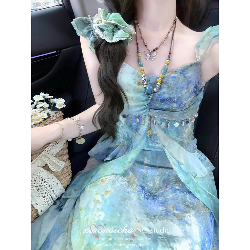 海边度假风印花小飞袖吊带连衣裙女2025夏季新款收腰仙女长裙子
