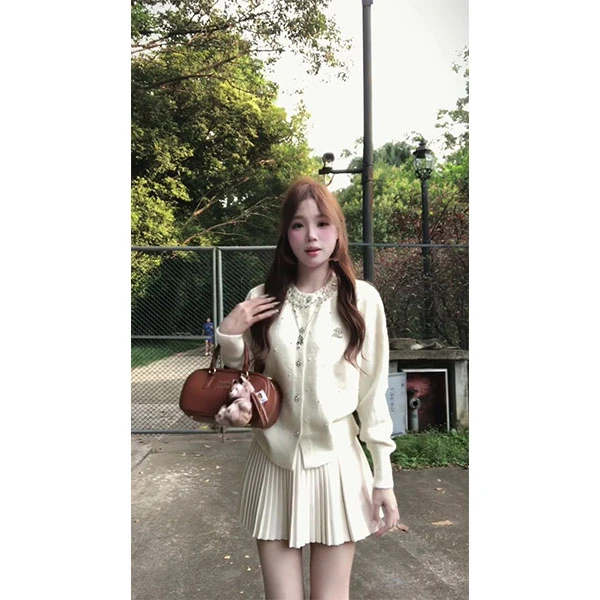 韩系一整套ootd穿搭独特超好看针织开衫a字短裙两件套装2025秋季