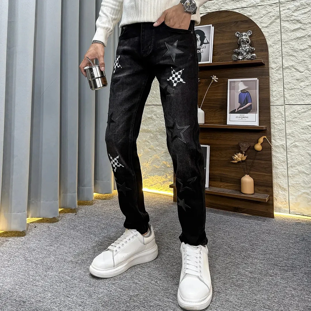 秋冬季休闲裤高端个性潮流男款黑色贴皮刺绣修身时尚小脚牛仔长裤