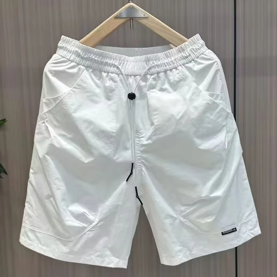 2025夏季薄款工装拼接抽绳透气短裤男户外宽松百搭速干休闲沙滩裤