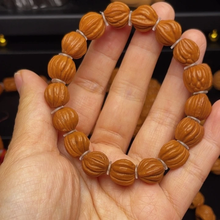 桃核吊坠佛手手串