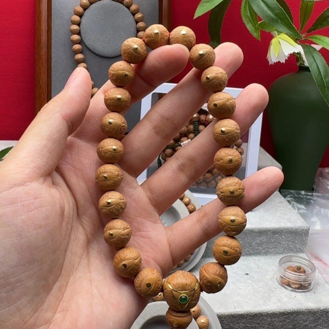 凤眼菩提手串12左右铜钉镶嵌手串