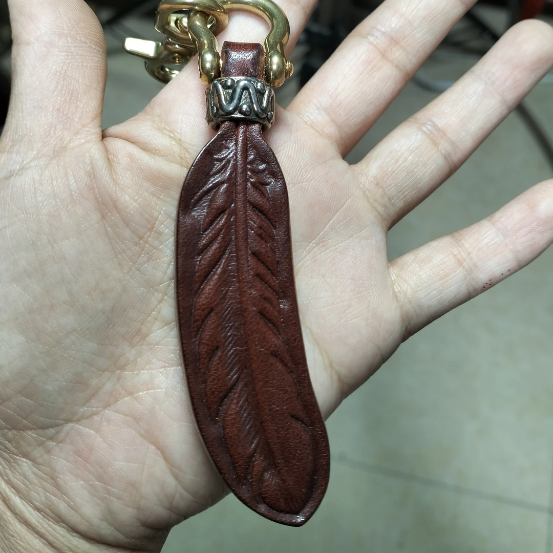 马疆皮块手工小羽毛钥匙链