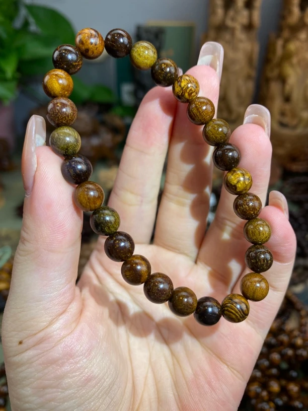 （小小多宝）巴布亚贡木全玉化圆珠0.8×26颗单圈手串