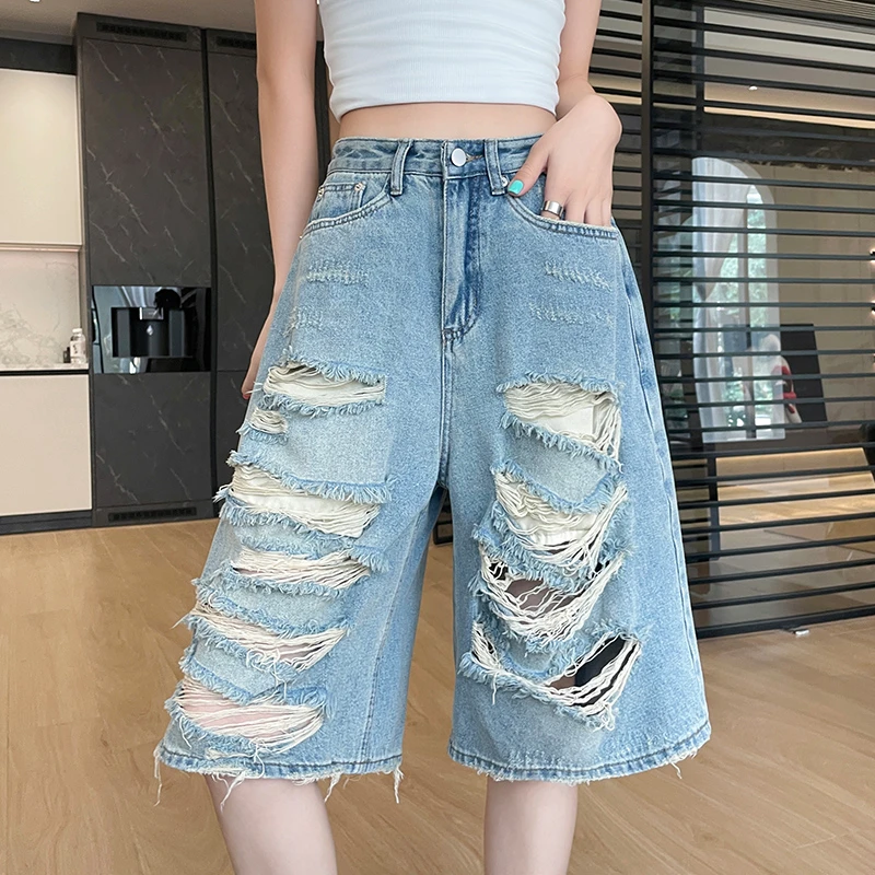 蜜蜜穿搭超火前后破洞五分阔腿牛仔裤女士2025夏季乞丐六分短裤子