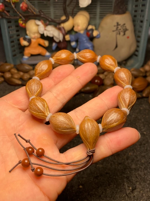 橄榄核1.3尺寸梅林老树老油核雕刻原皮素串文玩铁核手链