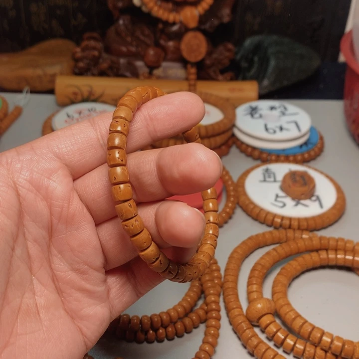 桃核吊坠起*了桃核手串镶嵌2