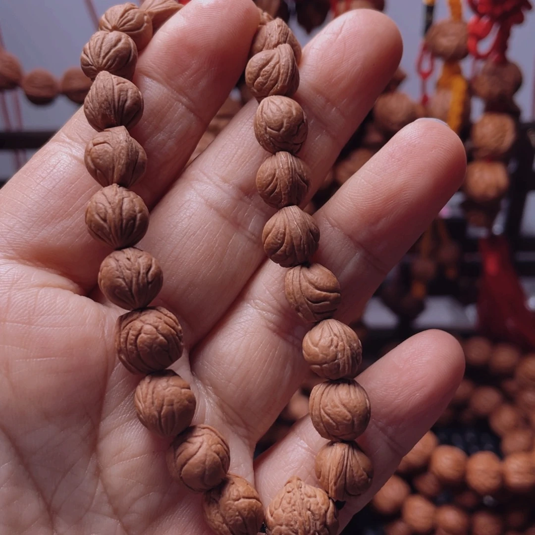 *****木质类龙纹桃枭手串