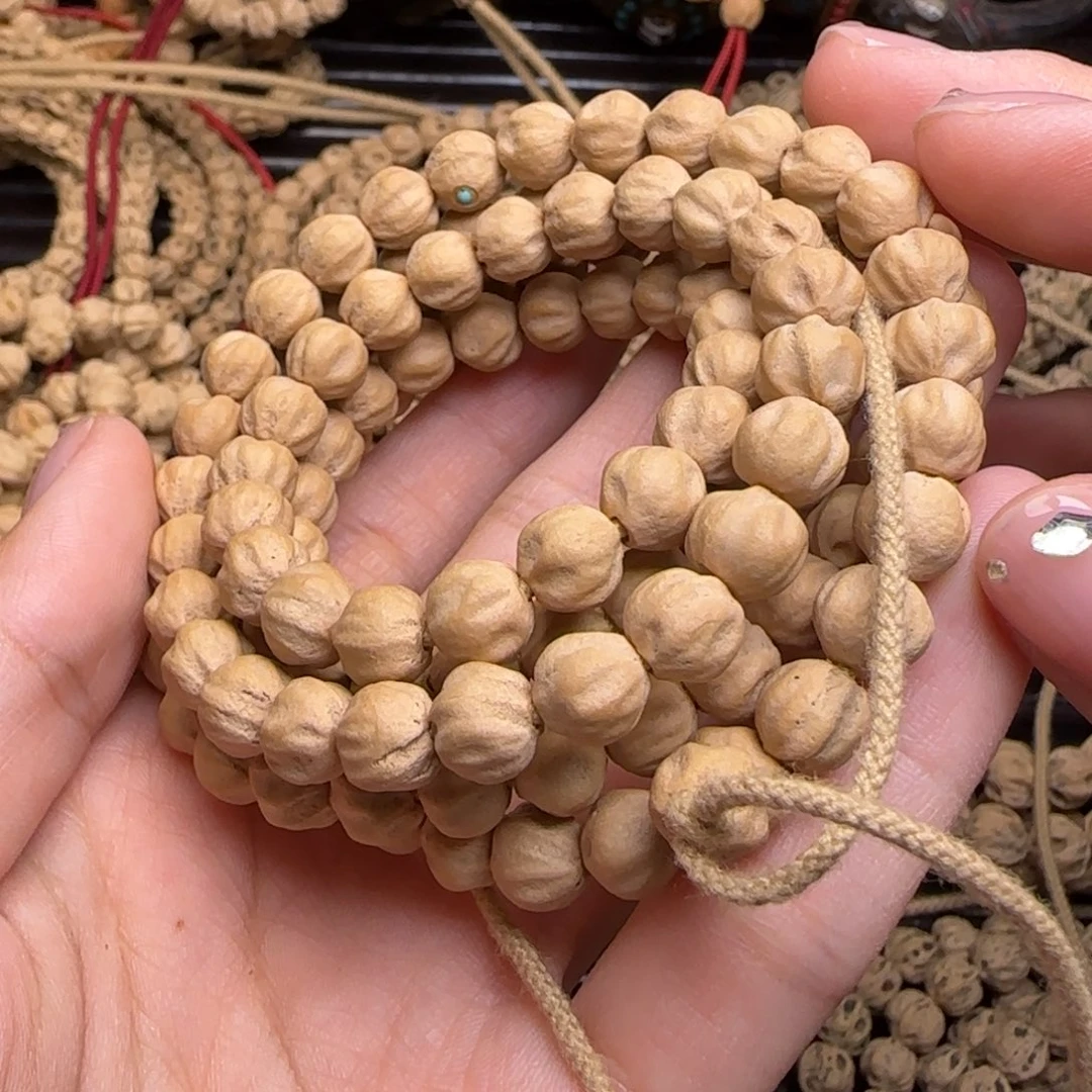 柏香籽/百香籽吊坠贩****生