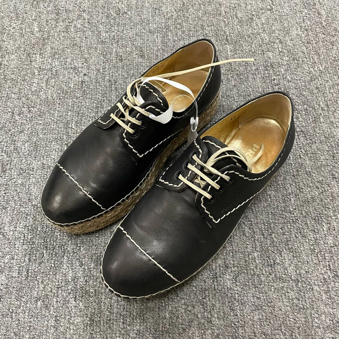 95新 Prada/普拉达 纯色系带时尚厚底鞋 37码/6245