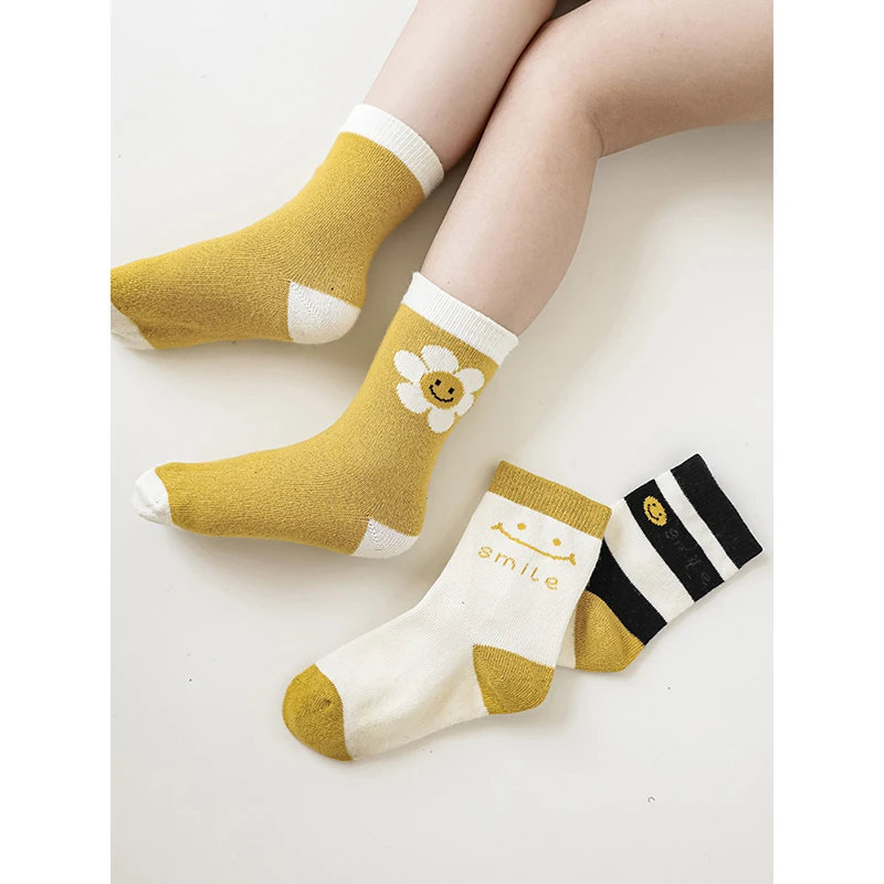 拼接色笑脸提花弹软纱线春秋儿童男女中筒长袜 GS0725