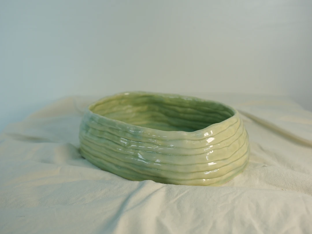 聋哑儿童手工    聚宝盆