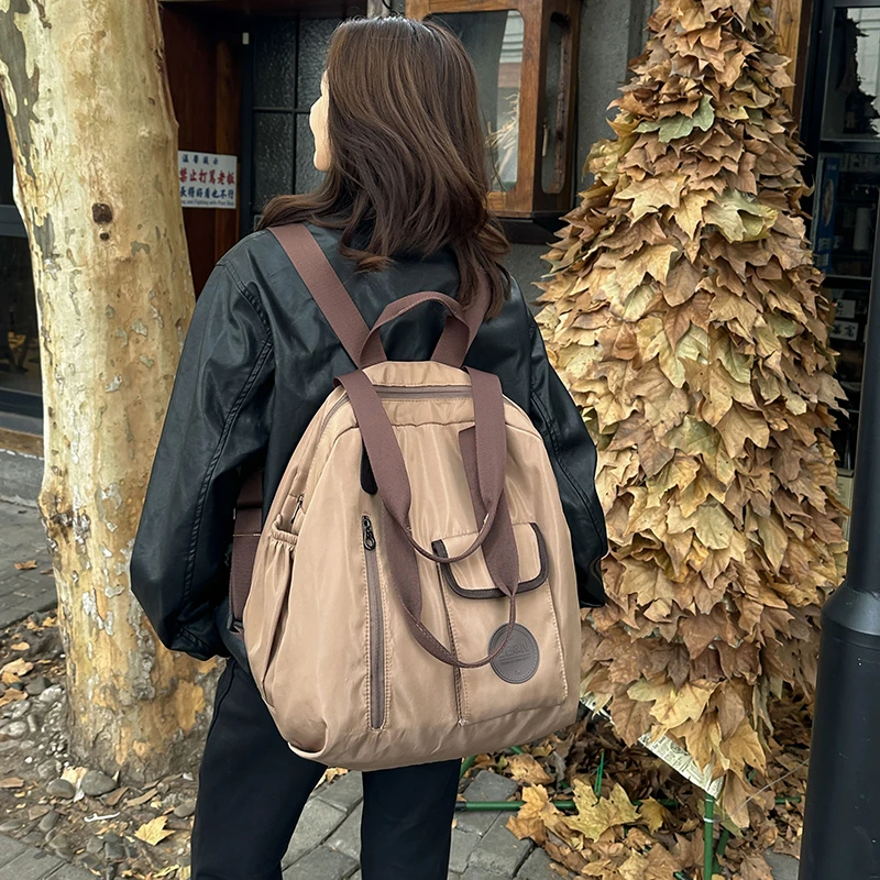 尼龙布双肩包女大容量上课学生书包韩版潮流单肩轻便出行旅游背包