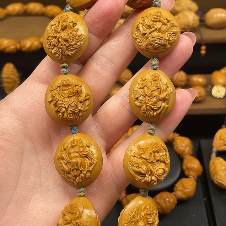 1***，橄榄核手串/手链双面骑兽罗汉