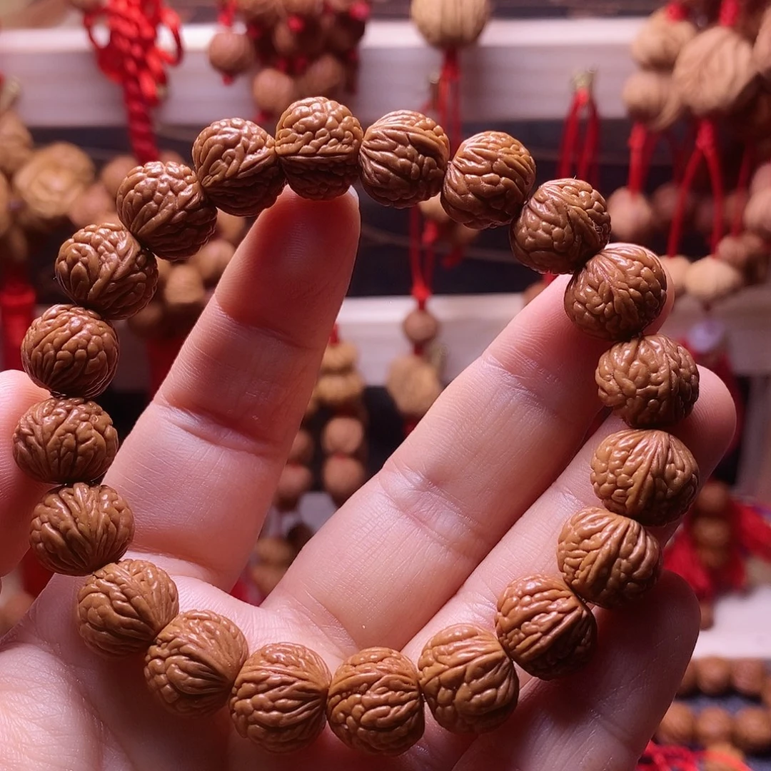 木质类龙纹桃枭手串