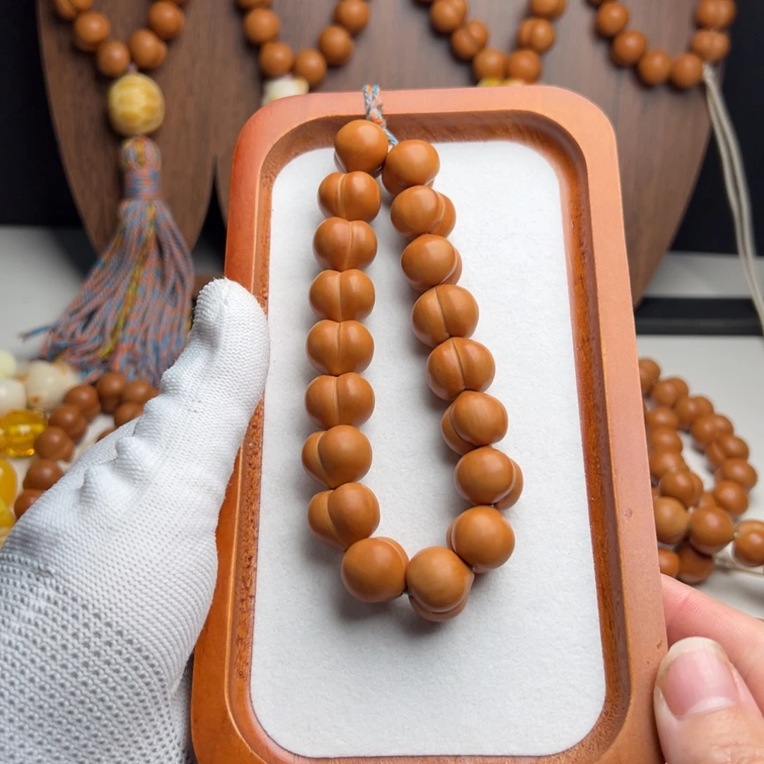 用***3吊坠猴头核桃屁桃