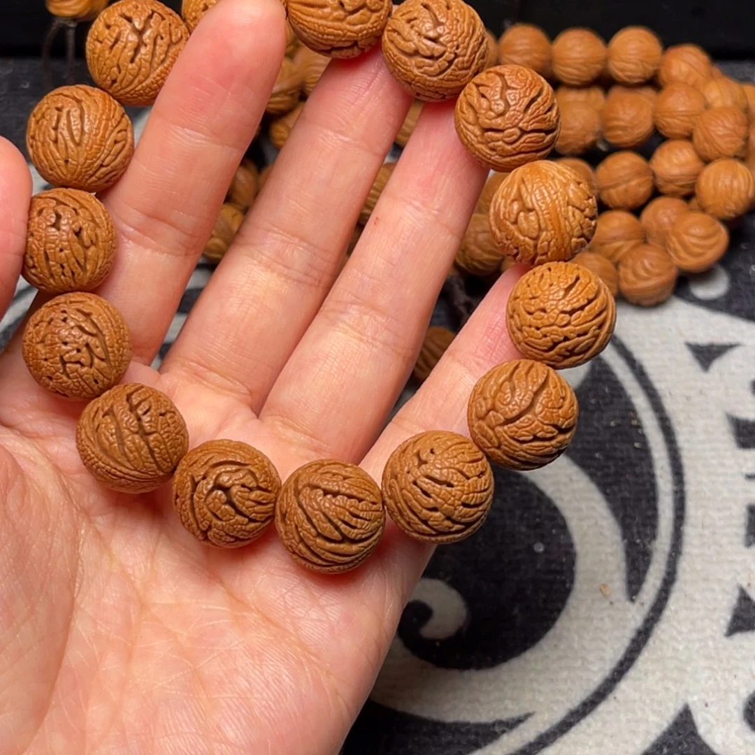 桃核手串龙纹绣球16