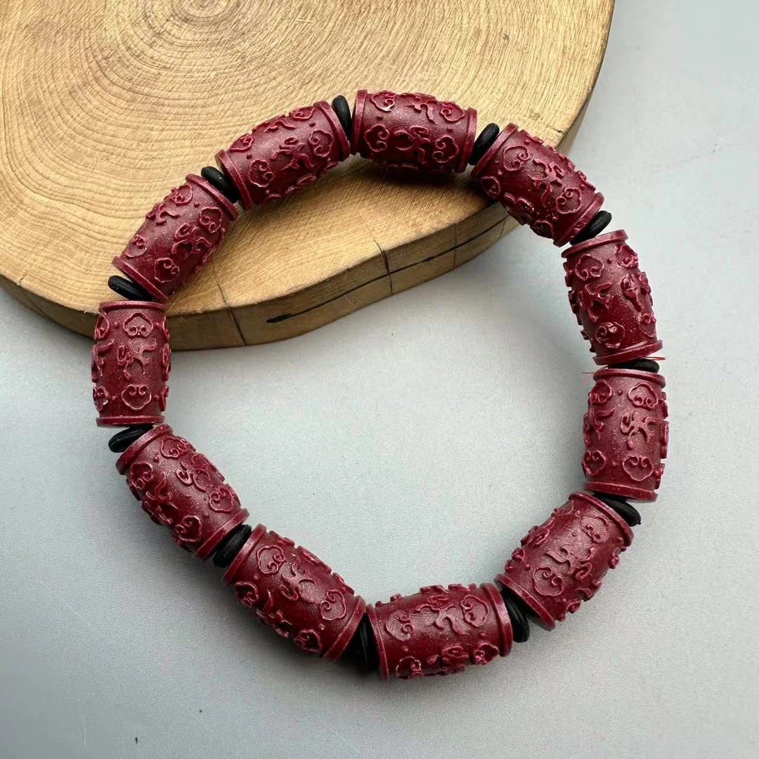 含辰砂工艺品GA470-紫色雕刻桶珠配黑色隔片手串