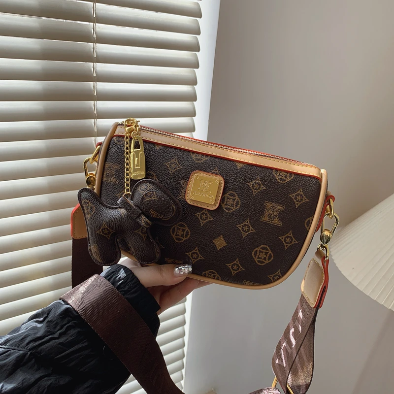 小众腋下包包女2025新款潮时尚百搭洋气饺子包宽肩带单肩斜挎包女