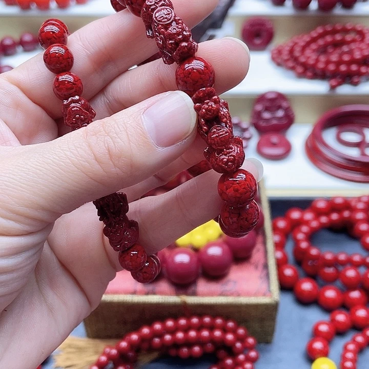 天然辰砂晶体沙卡10两个貔貅