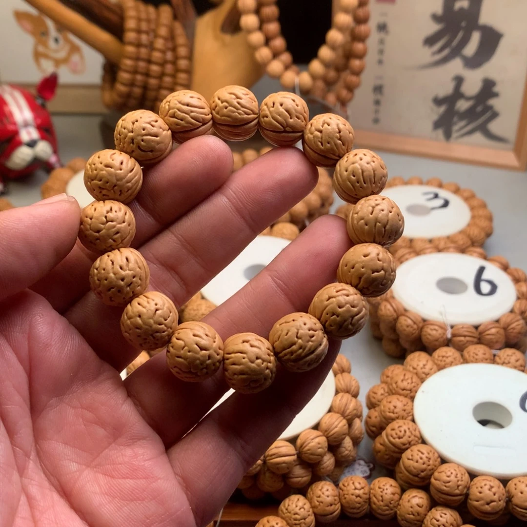 X***。手串桃核1.6金丹桃核手串