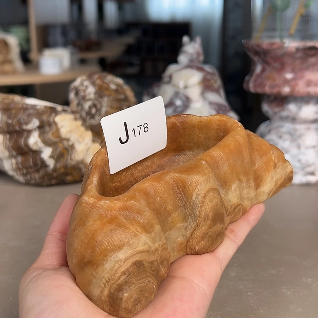 饺***家石材J178云中玉牛角包