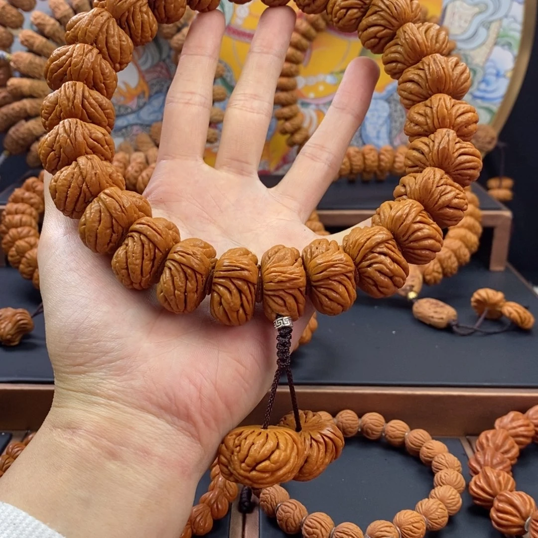 桃核手串龙纹桃核麒麟