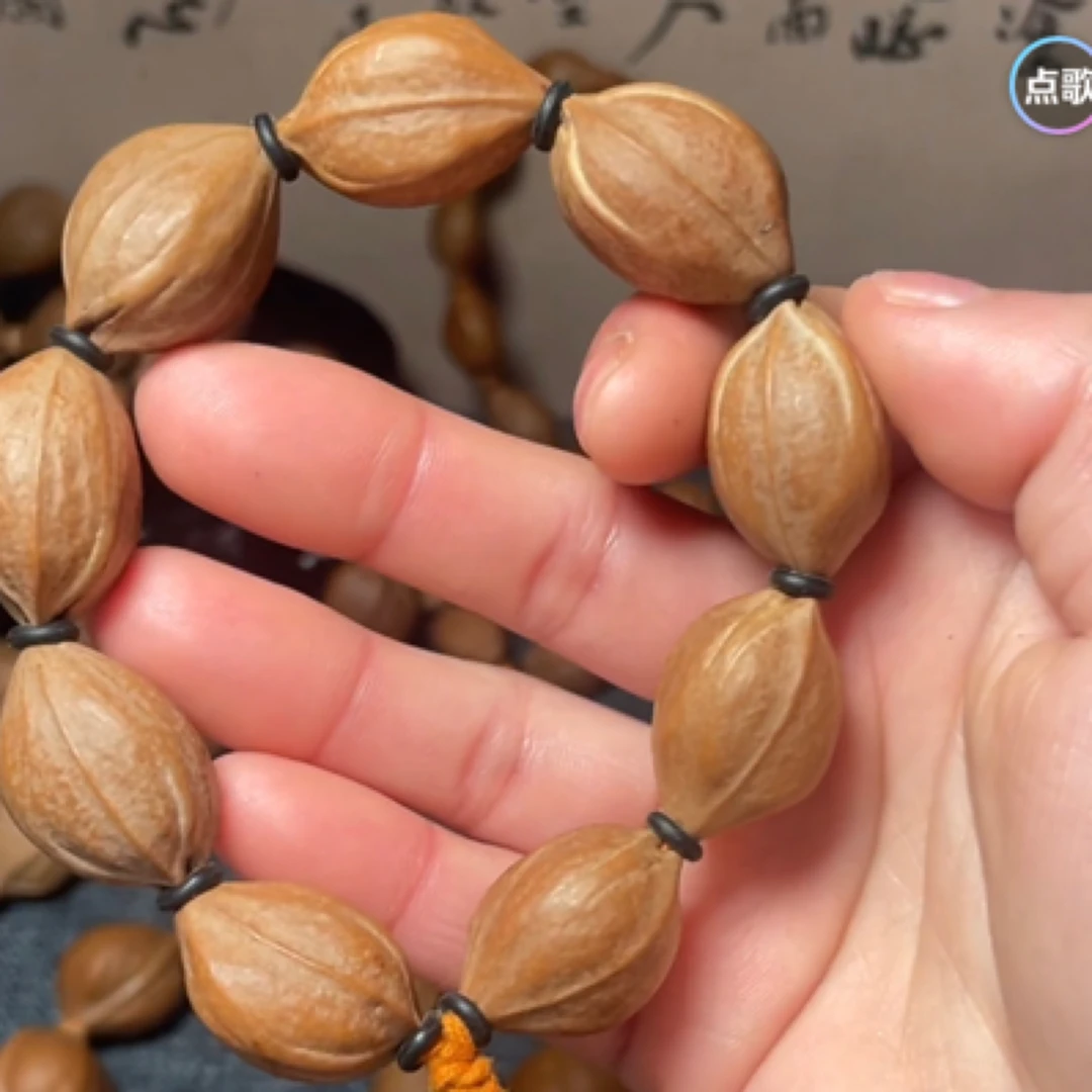 1826梅林铁核三花橄榄素核原皮手串