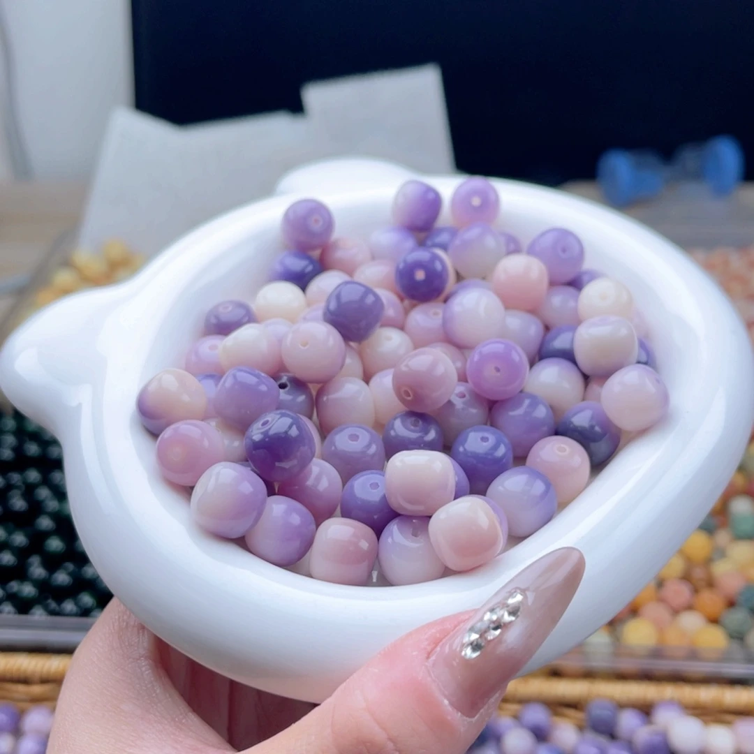 白玉菩提吊坠q11.75mm110颗。紫玉蝶玉化