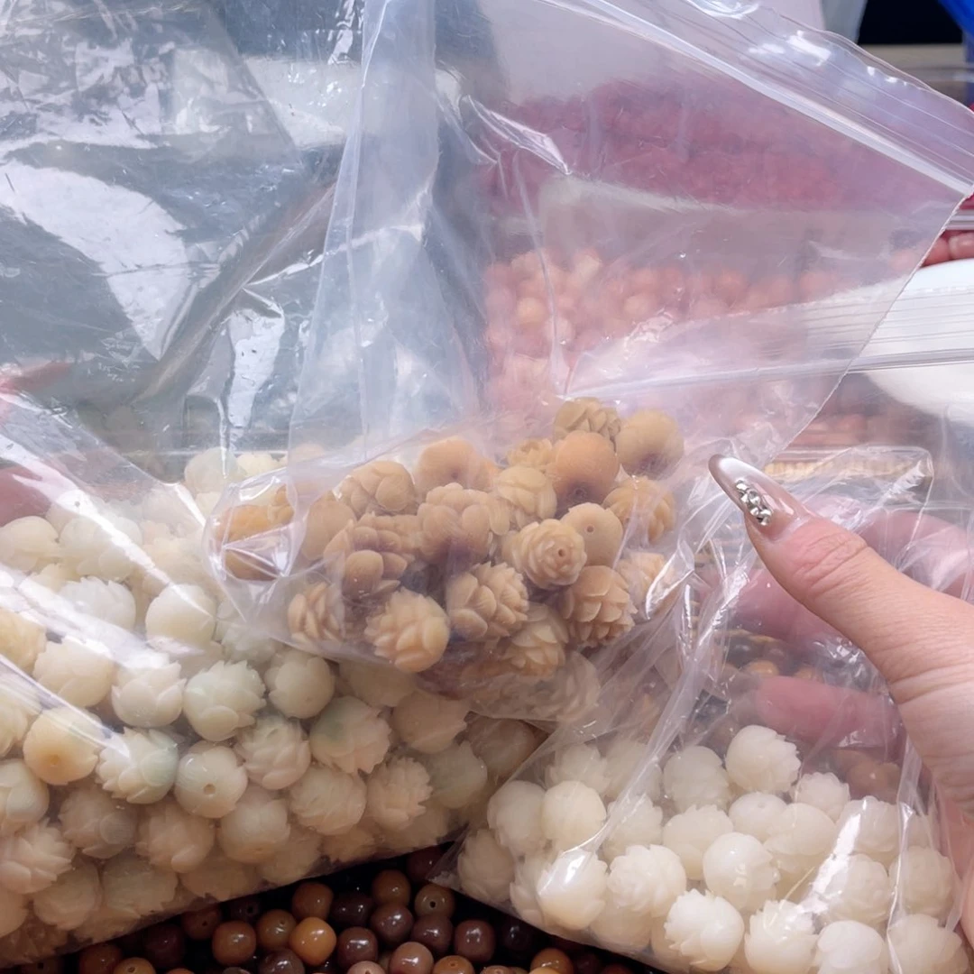 白玉菩提吊坠q16-18mm12颗。大连花