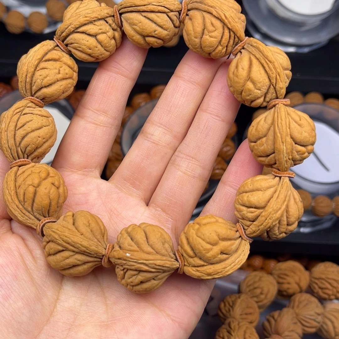 唐***子桃核吊坠霸王龙单圈