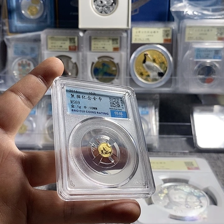 纯金69分无盒证16年1克金猫一枚如图