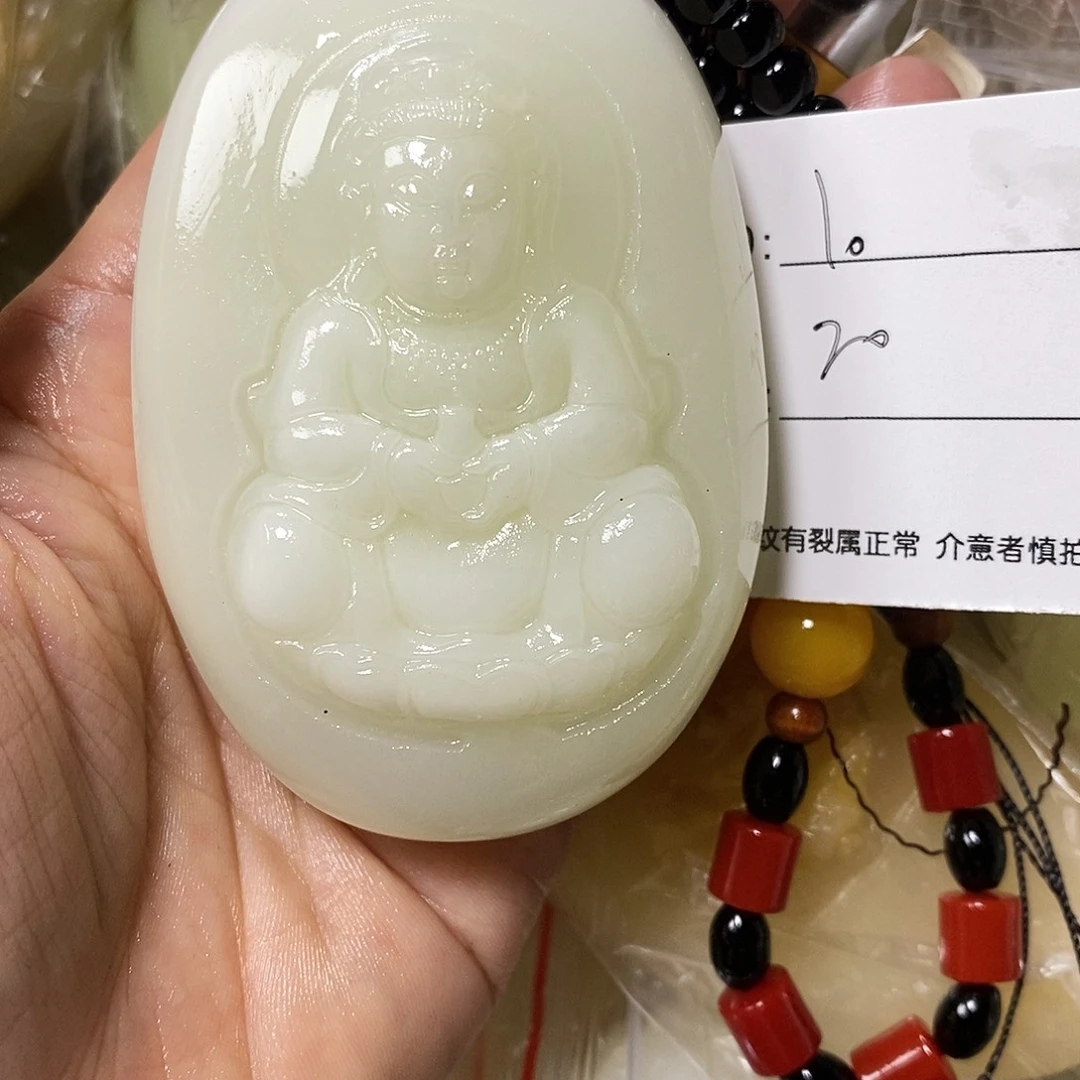 石材l***。古青石手把件