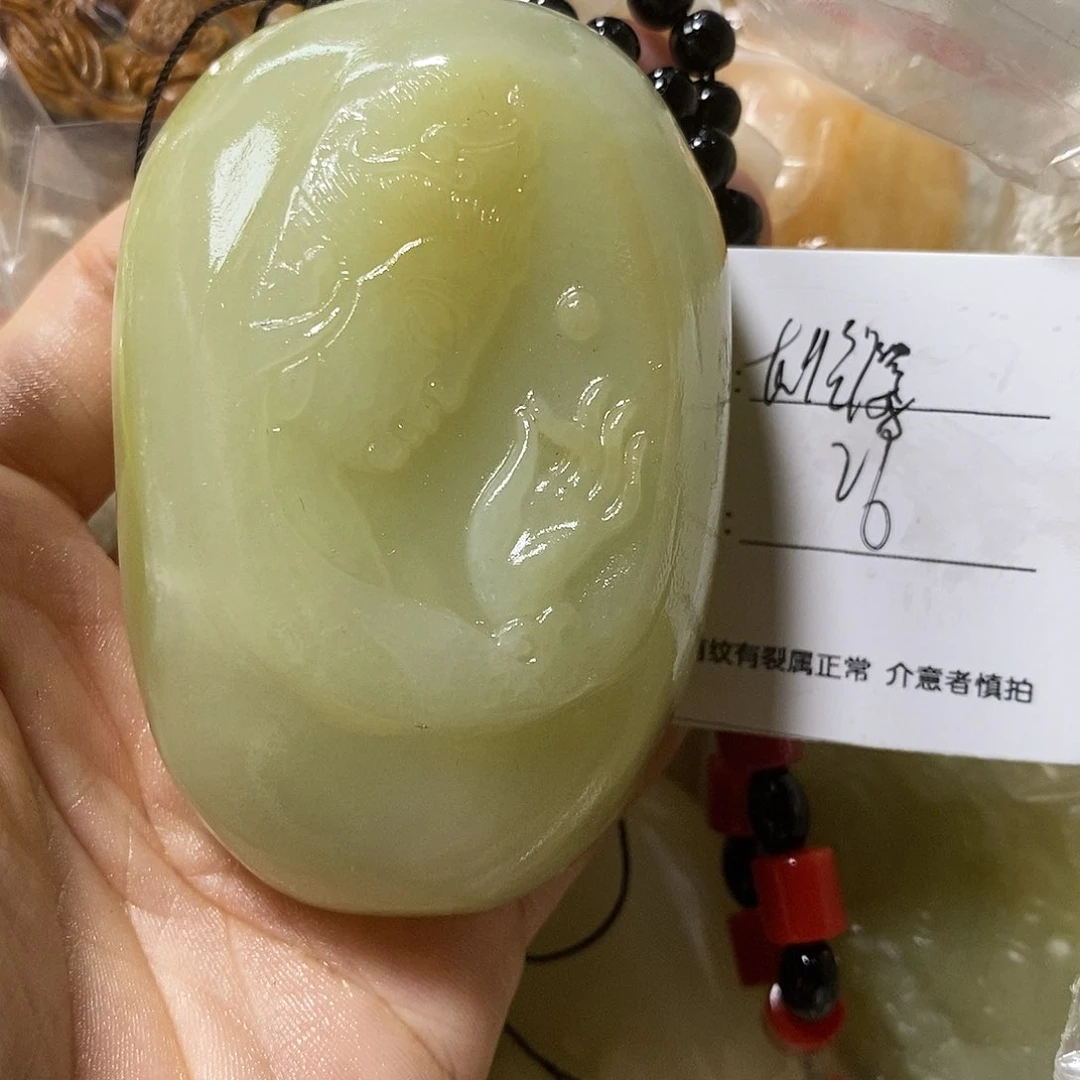 石材雄**翅古青石手把件
