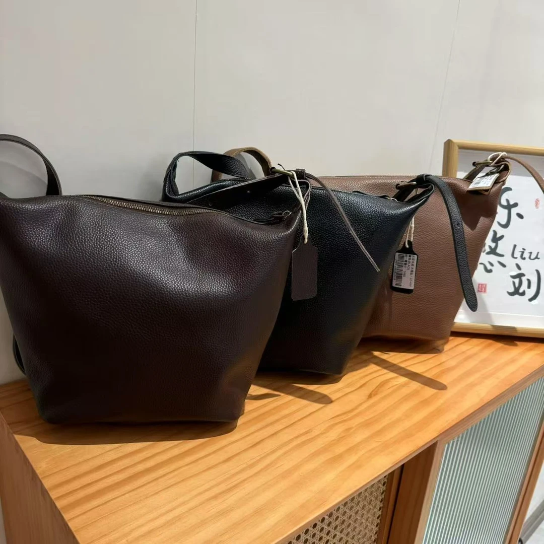 喜樂水桶包春季新款时尚百搭高级感牛皮文艺复古斜挎单肩女士