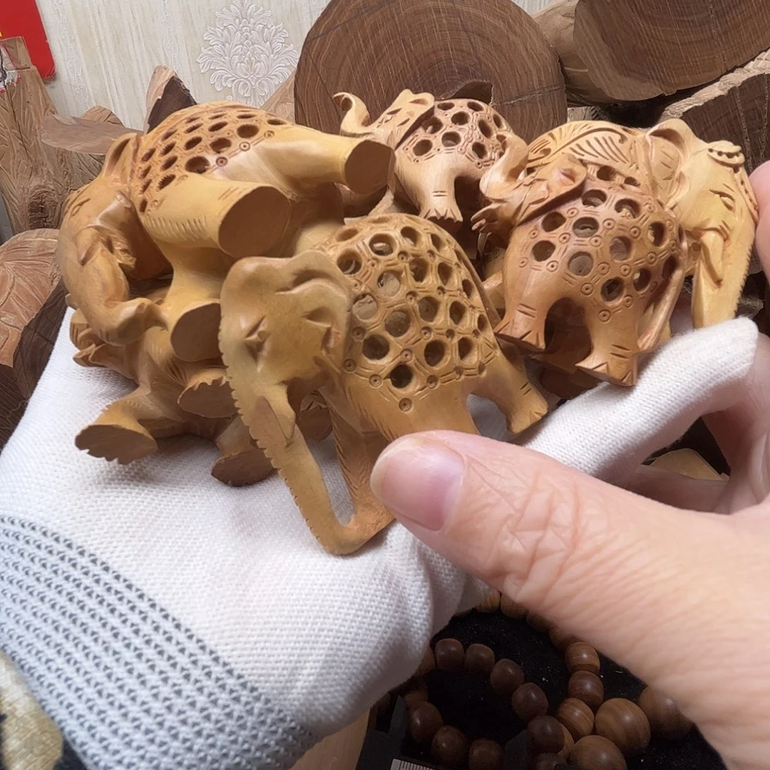 碧***潇檀香木其他定制大象8个