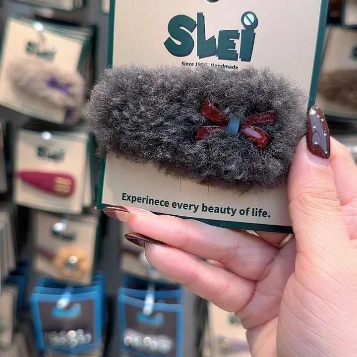 灰色红蝴蝶结掰掰夹毛毛