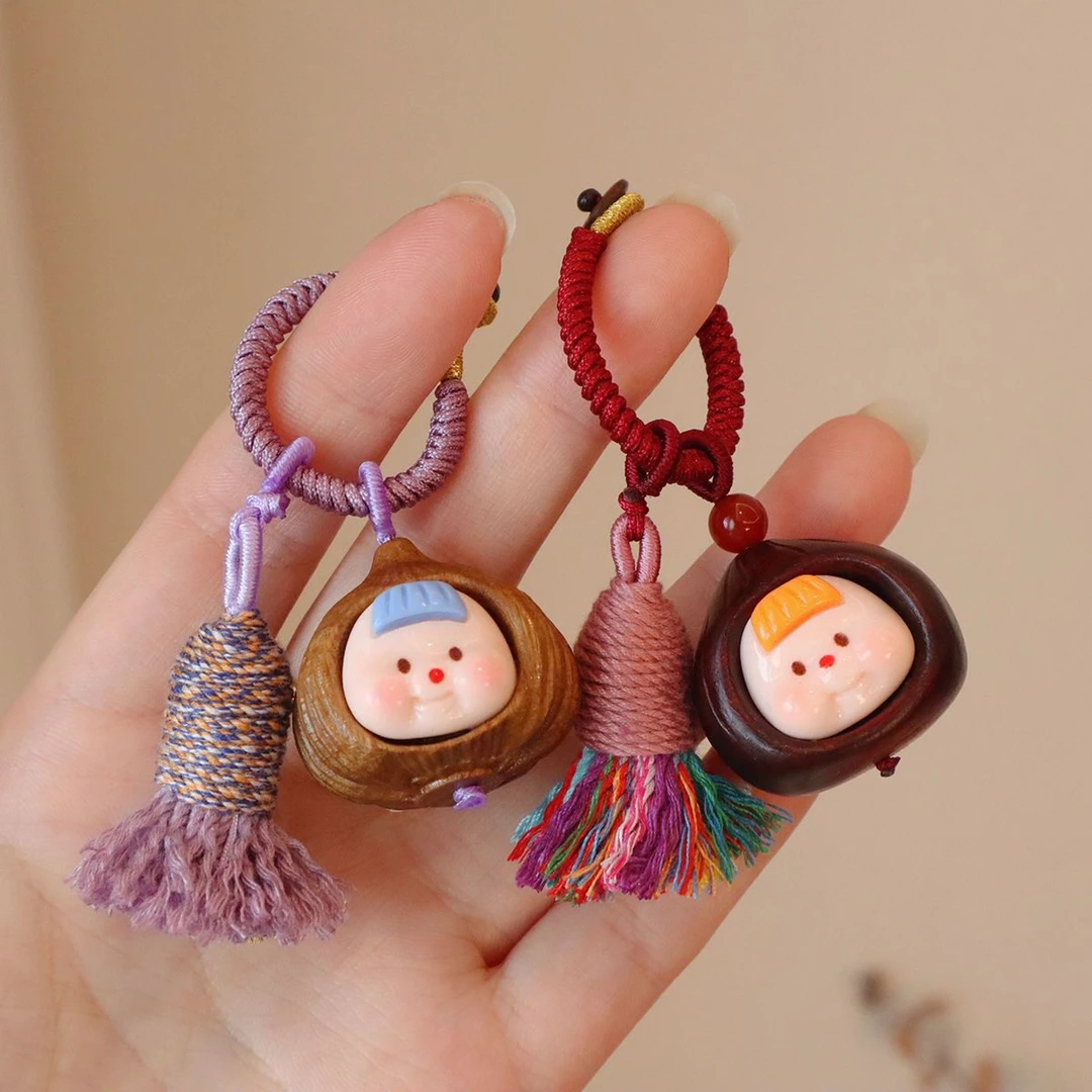 新款2025木雕卡通可爱板栗多妹大蒜挂件绿檀木手机链包包挂钥匙扣