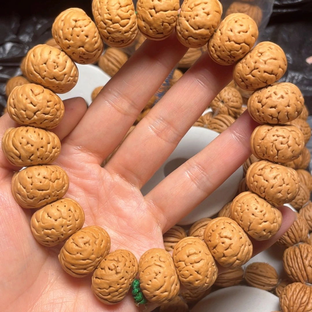 林***ⁿ吊坠桃核桃核手串20+钮扣