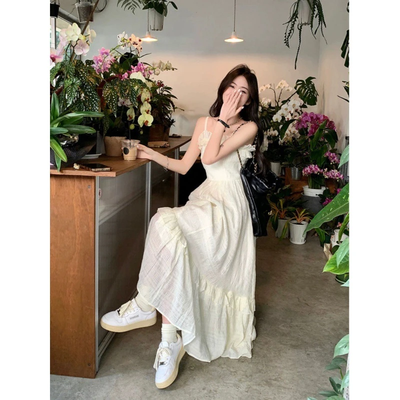 木耳边吊带连衣裙女夏季2025新款甜美法式收腰显瘦设计感气质长裙