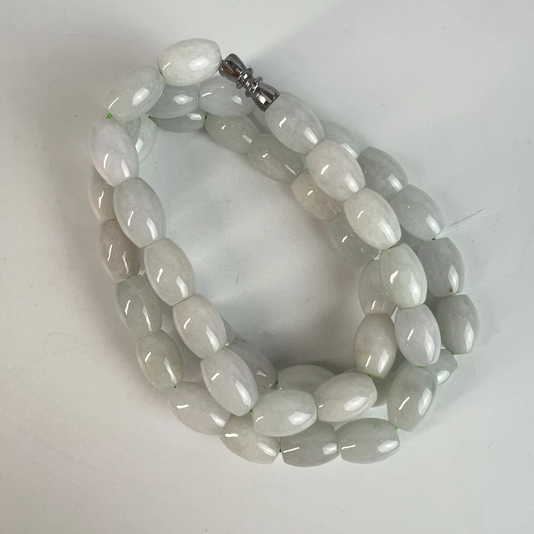 TM 1007172 近现代 翡翠雕桶珠链