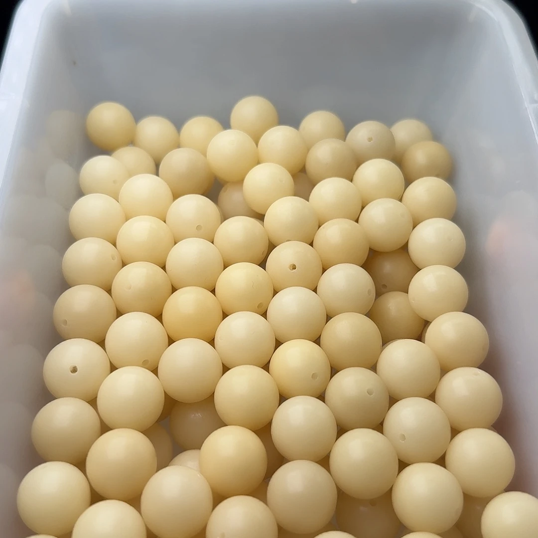 吊坠菩提根/象牙果50颗奶黄15圆