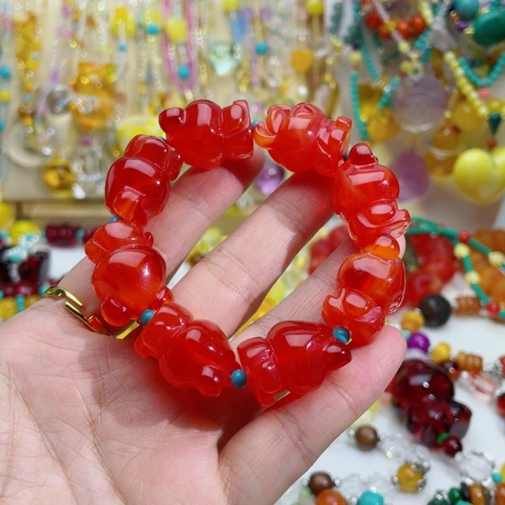 菲***儿无非金属7号红色小熊手串