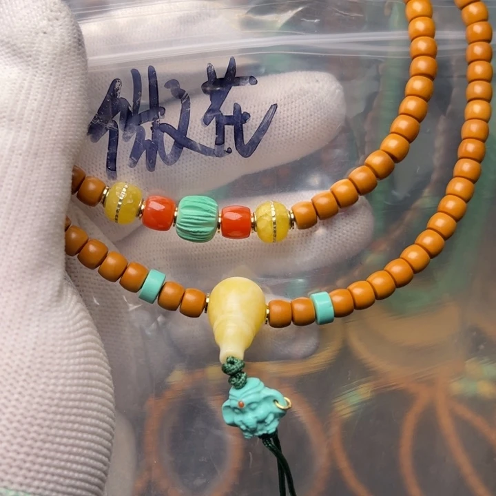 橄榄核吊坠哈哈哈