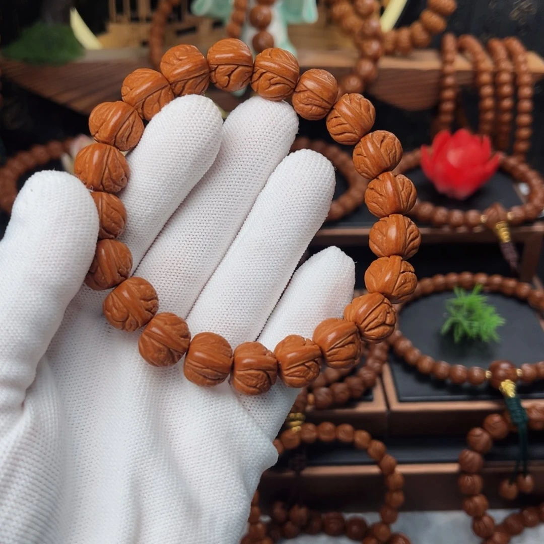 吊坠桃核13玉龙脊手串