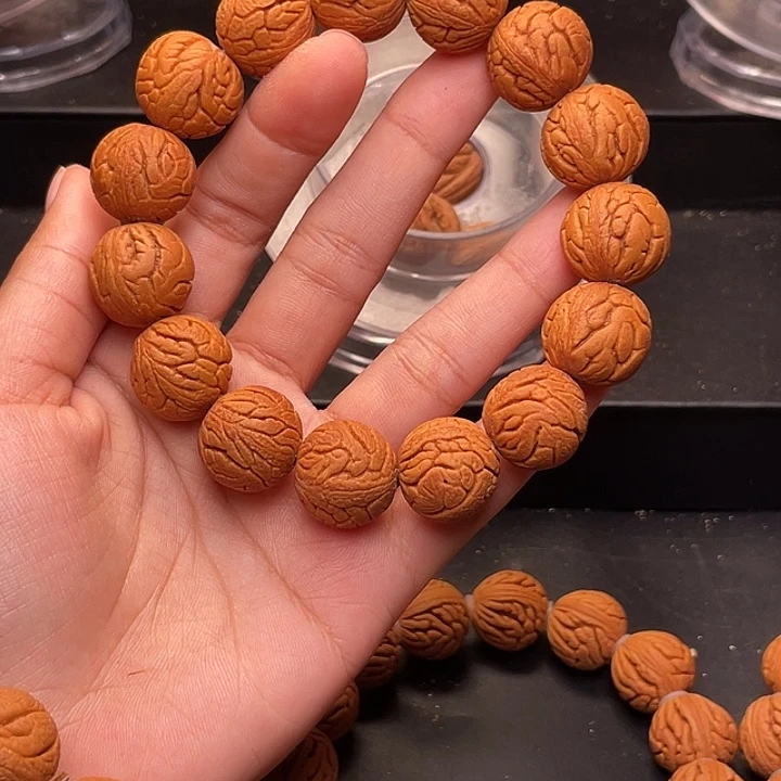 不***.手串桃核金丝龙珠1.6