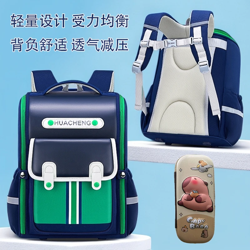 新款小学生书包男一二三到六年级女减负护脊轻便儿童双肩背包防水