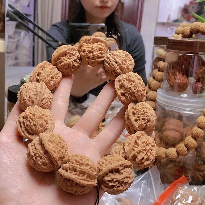 【闪购商品】文玩核桃把件32凤眼手持